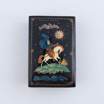 A set of three Russian lacquered papier-maché boxes, one of which from the Lukutin manufactory, 19th -20th century.