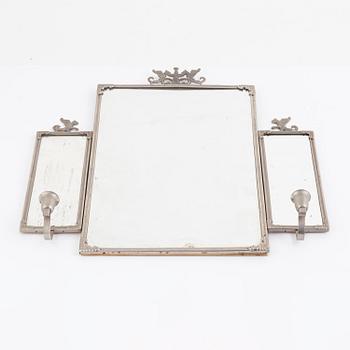 A Swedish Grace mirror and a pair of wall sconces, 1920's/30's.