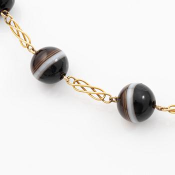 Necklace, 14K gold with banded agates.