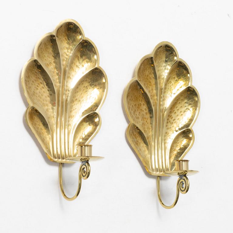Lars Holmström, a pair of brass sconces, Swedn, first half of the/mid20th century.