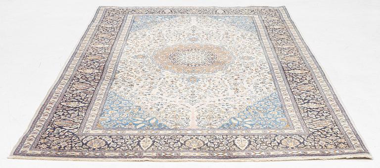 A oriental rug, c. 260 x 155 cm.
