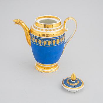 A 13 piece Empire porcelain coffee service, marked T.G.C. Paris, France, first half of the 19th century.