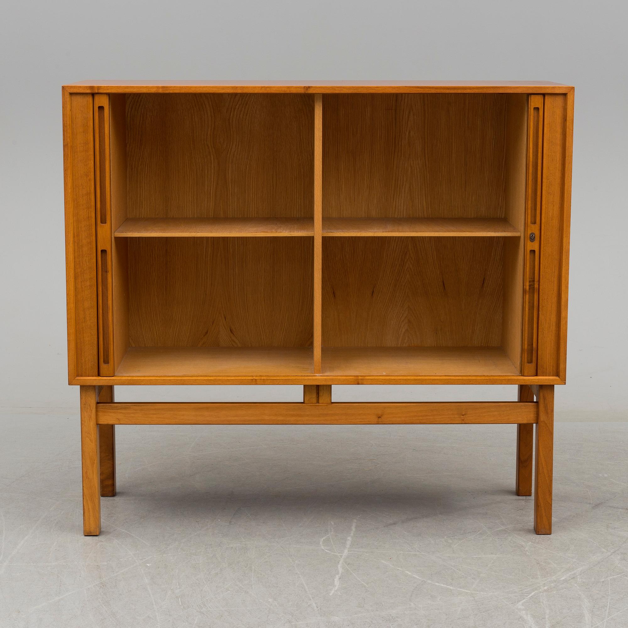A Walnut veneered cabinet, 1950's/60's.