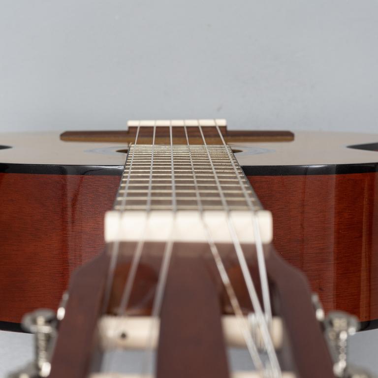 Jill Johnson, a signed acoustic guitar.