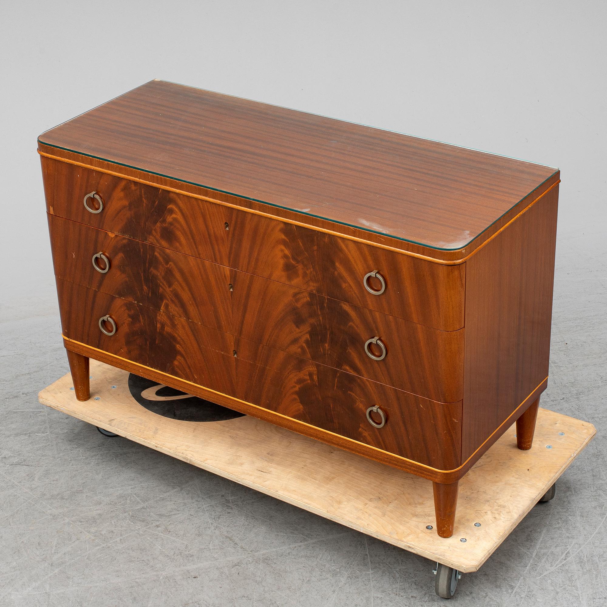 A chest of drawers, mid 20th century.