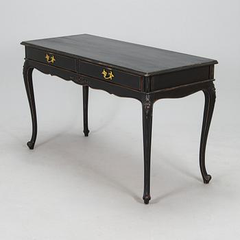 A late 20th century rococo style writing desk.