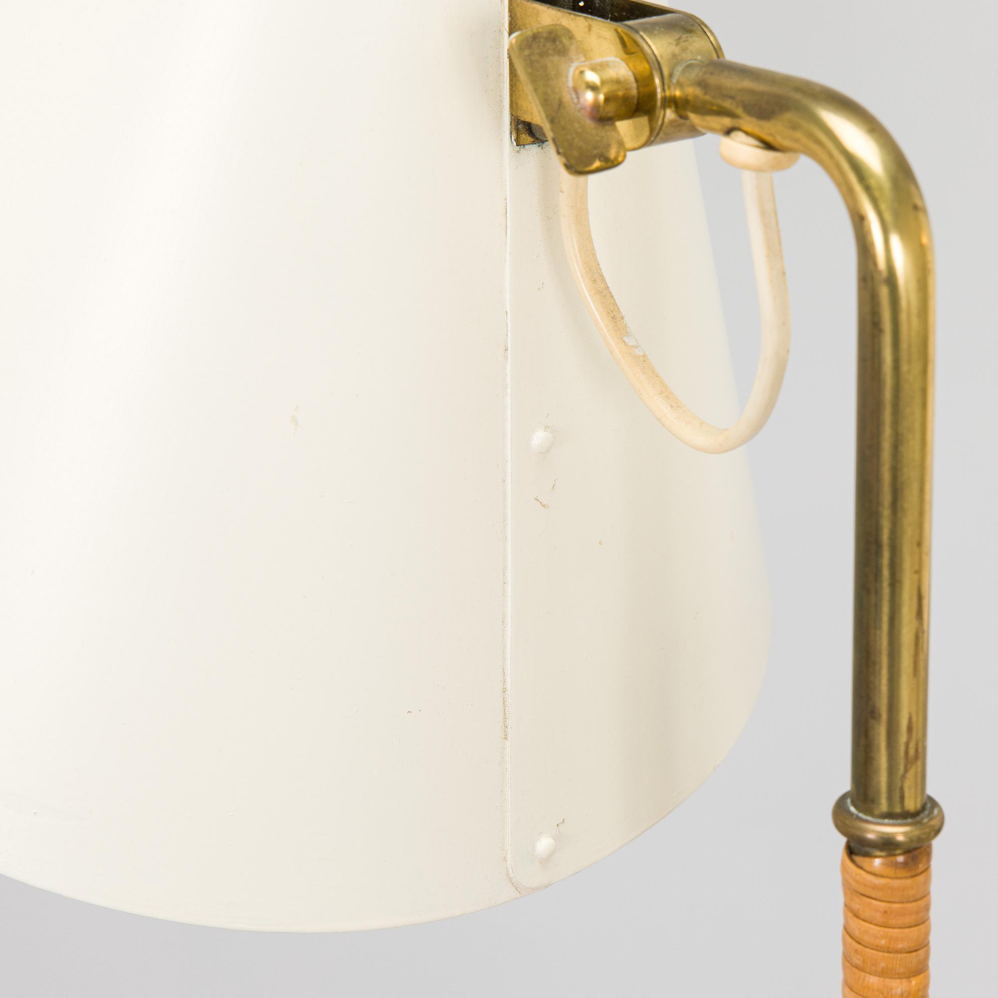 Paavo Tynell, a pair of mid-20th century K10-10 floor lamps for Taito Finland.