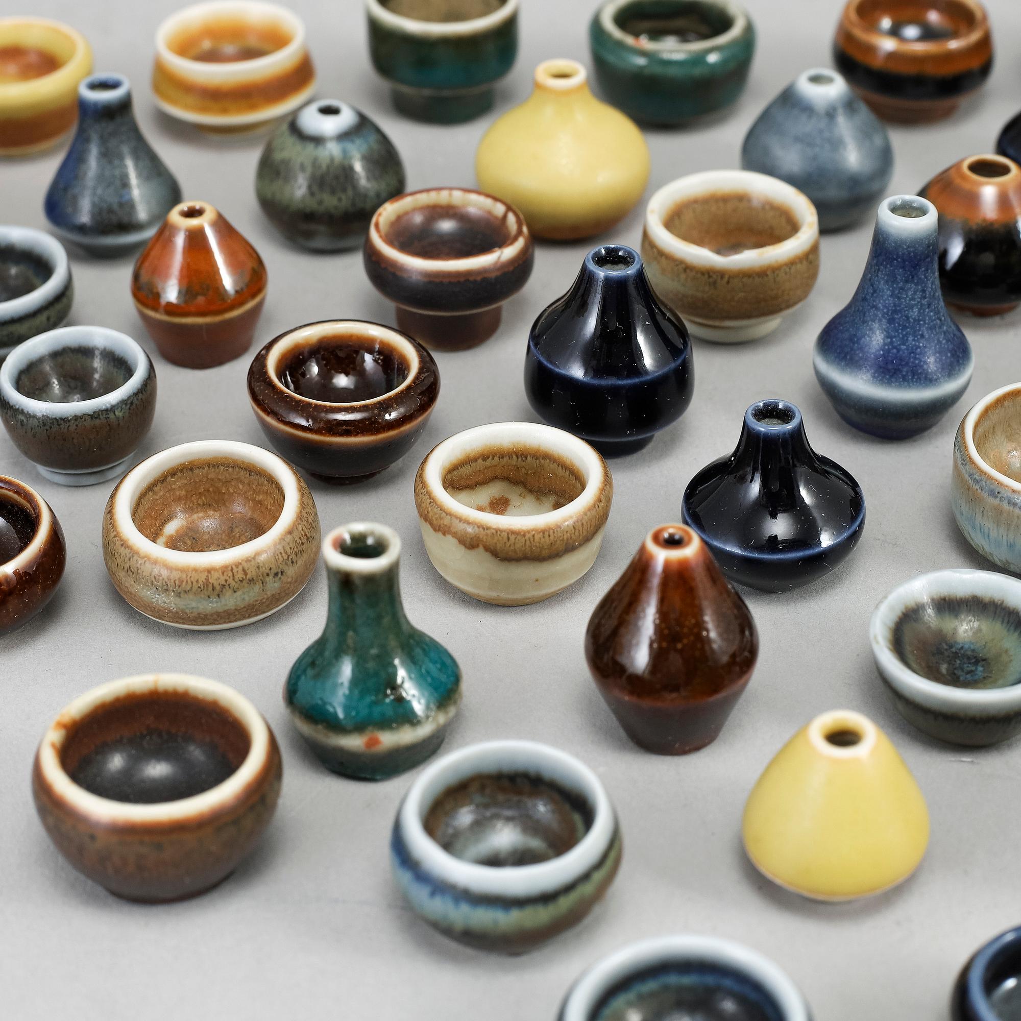 RÖRSTRAND, a set of 52 stoneware mini miniature vases and bowls.