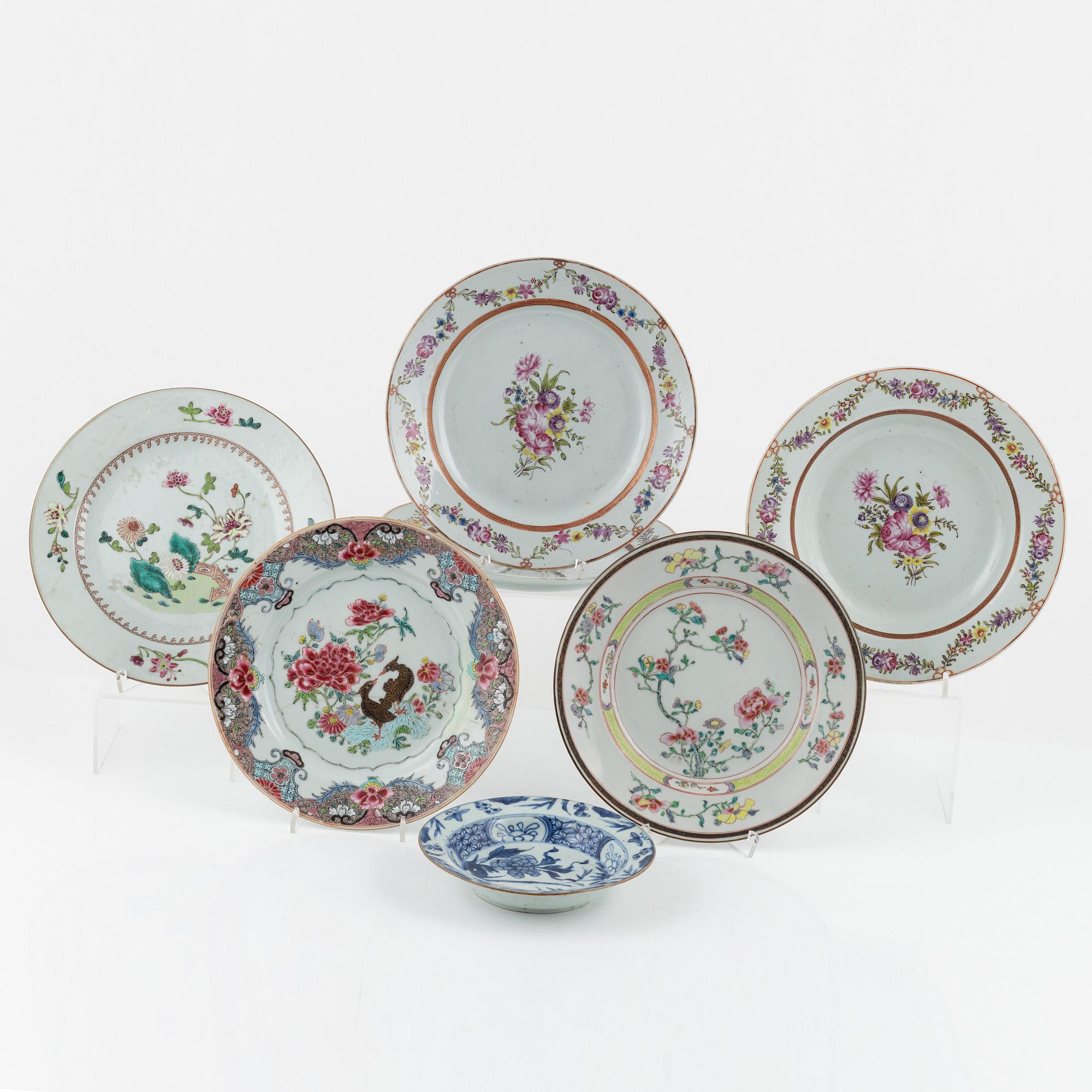 Six Famille Rose plates, and a blue and white dessert dish, China, 18th century.