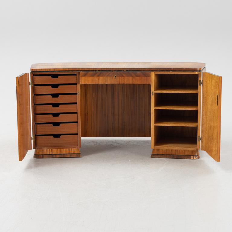 A zebrano veneered Swedish Modern desk, mid 20th Century.