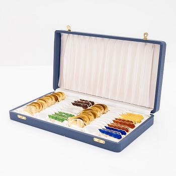 A set of 23 silver gilt and enamel coffee spoons, maker marks of Holger Lindström, Helsinki 1968.