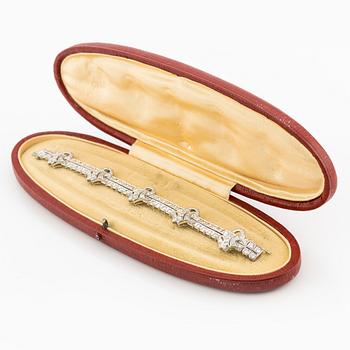 Armband platina med runda briljant, åttkant- och baguetteslipade diamanter, Gübelin.