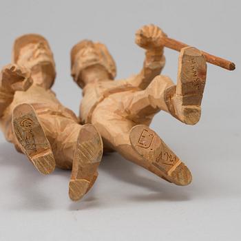 Emil Janel, a wooden sculpture, signed and dated Hansjö Orsa 1921.