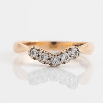 Gold and small brilliant cut diamond ring.