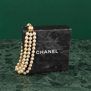 A necklace by CHANEL.