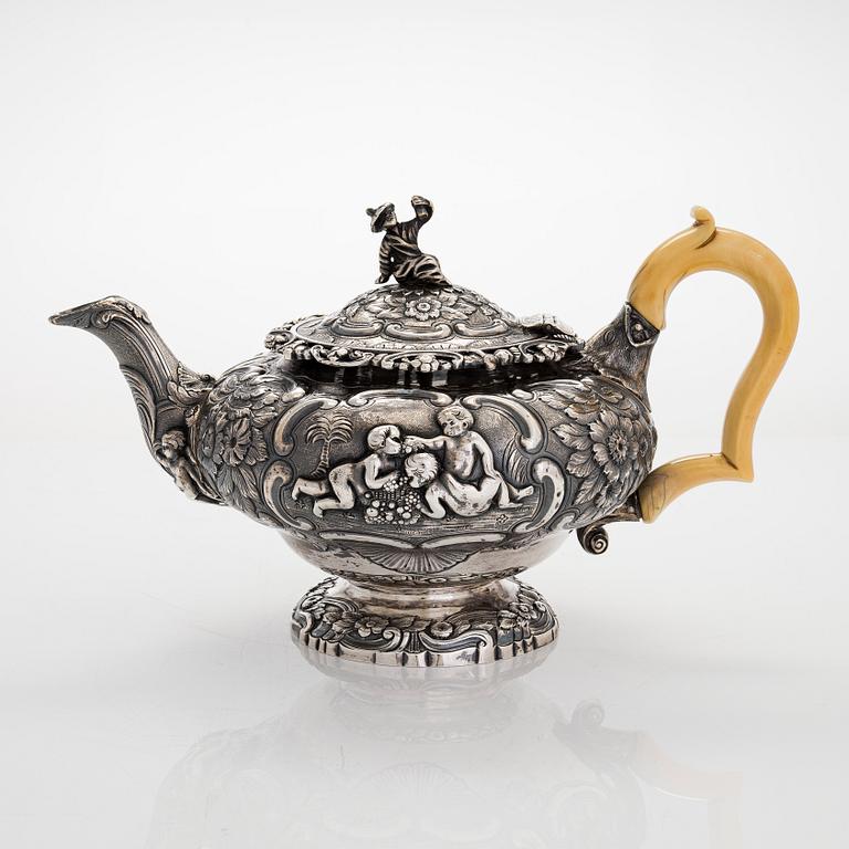 A Georgian seven-piece, sterling silver tea and coffee set, maker's mark of Joseph Angell, London 1817-1823.