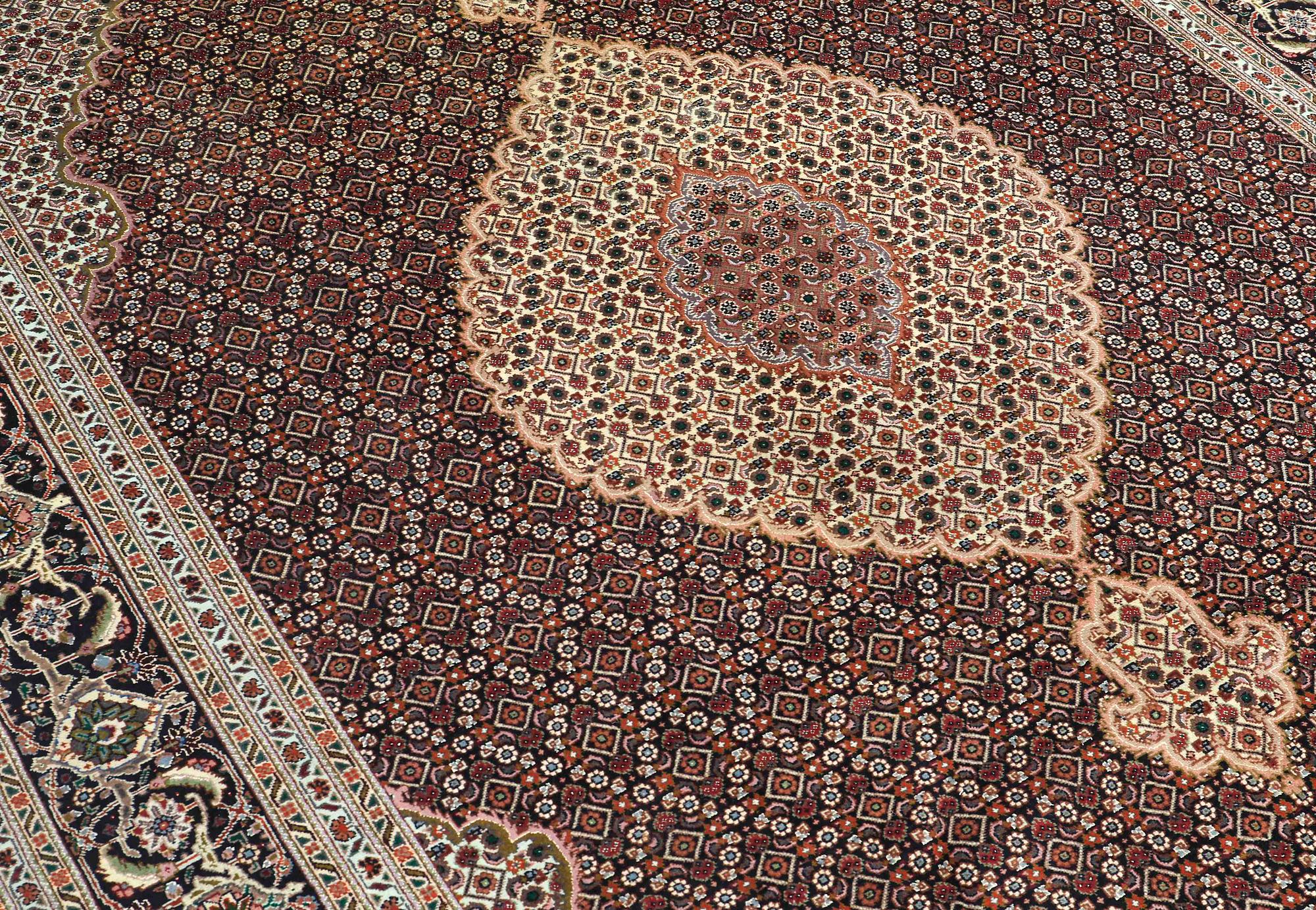 A CARPET, Tabriz part silk , so called 40 Radj, ca 298 x 202 cm.