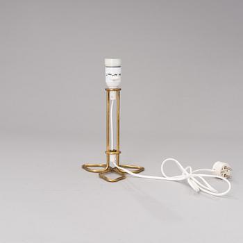 A mid-20th century brass table lamp model 61053 for Idman.