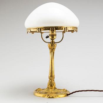 A gilt bronze Art Nouveau table light, early 20th Century.