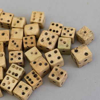 A COLLECTION OF 34 BONE MINIATURE DICE, 19th century.