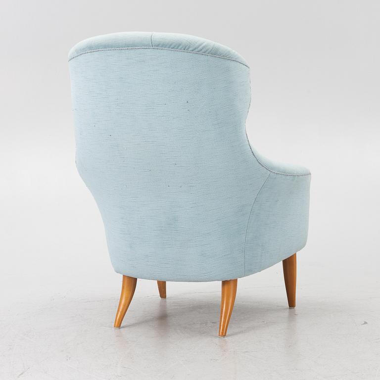 Kerstin Hörlin-Holmquist, an 'Onkel Adam' armchair, Triva series, Nordiska Kompaniet's workshops in Nyköping.