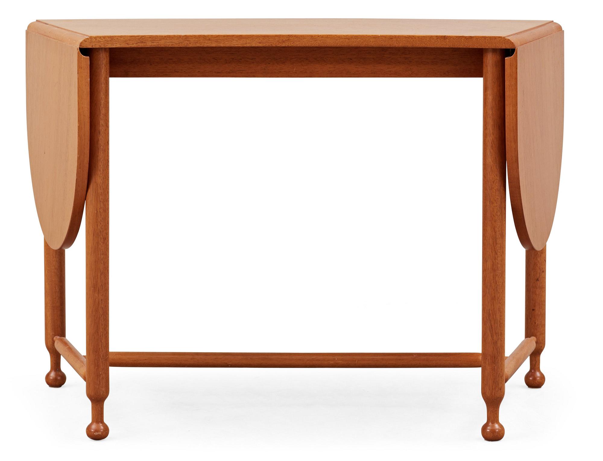 A Josef Frank mahogany table by Svenskt Tenn, model no 1333.