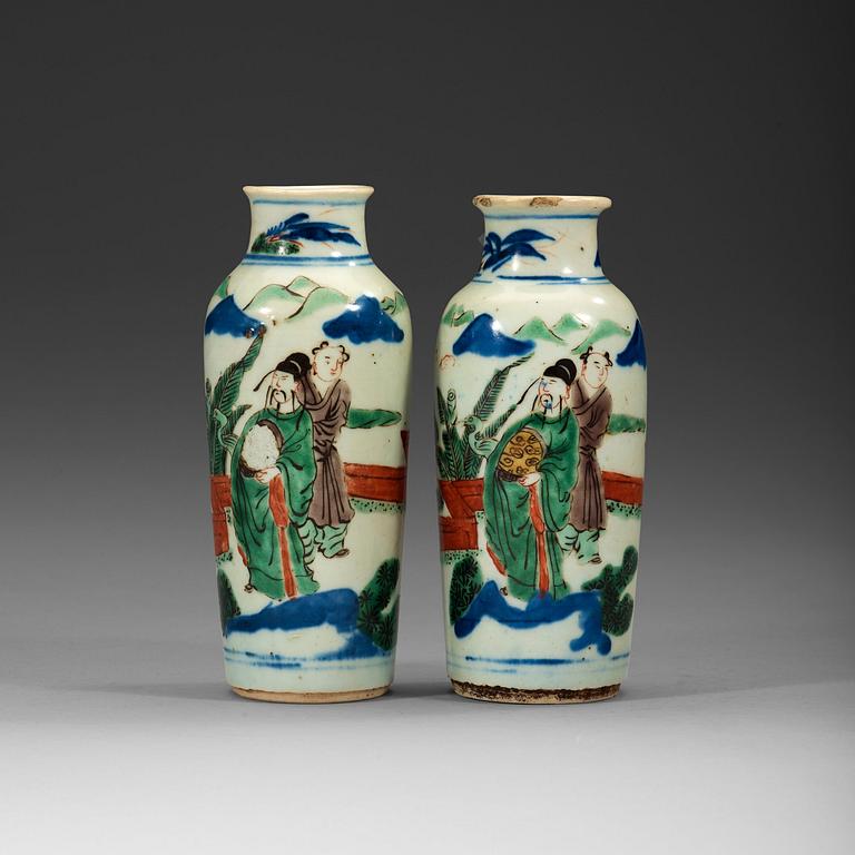 A pair of wucai transition vases, 17th Century.