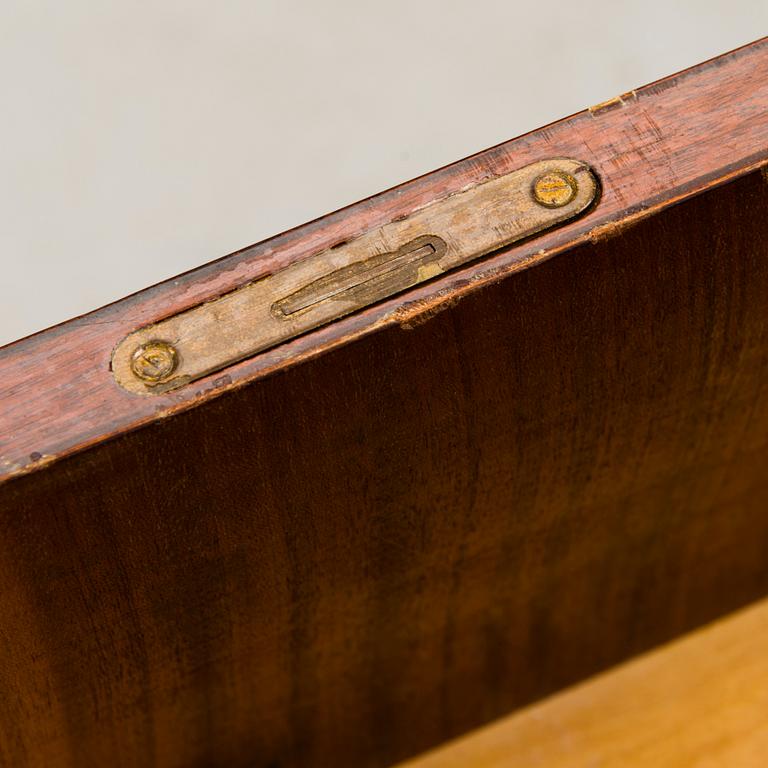 A chest of drawers, mid-20th Century.