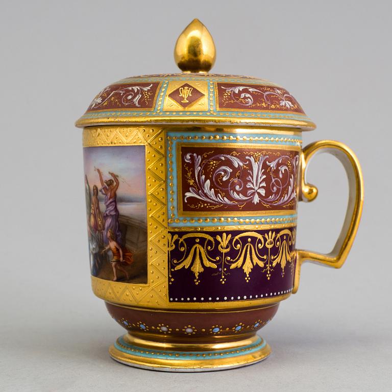 An early 19th century empire cup with saucer and cover with Wien mark.