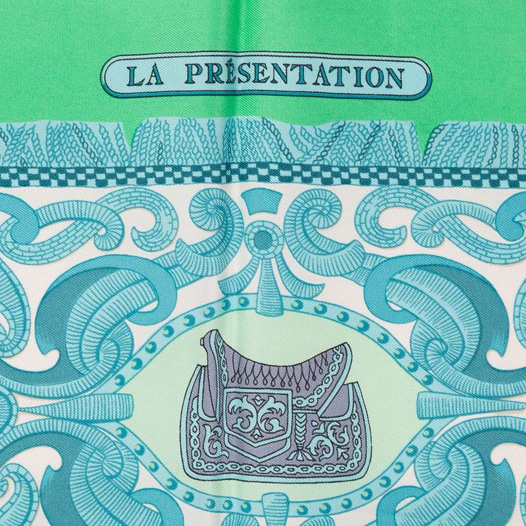 Hermès, a 'La Présentation' silk scarf.