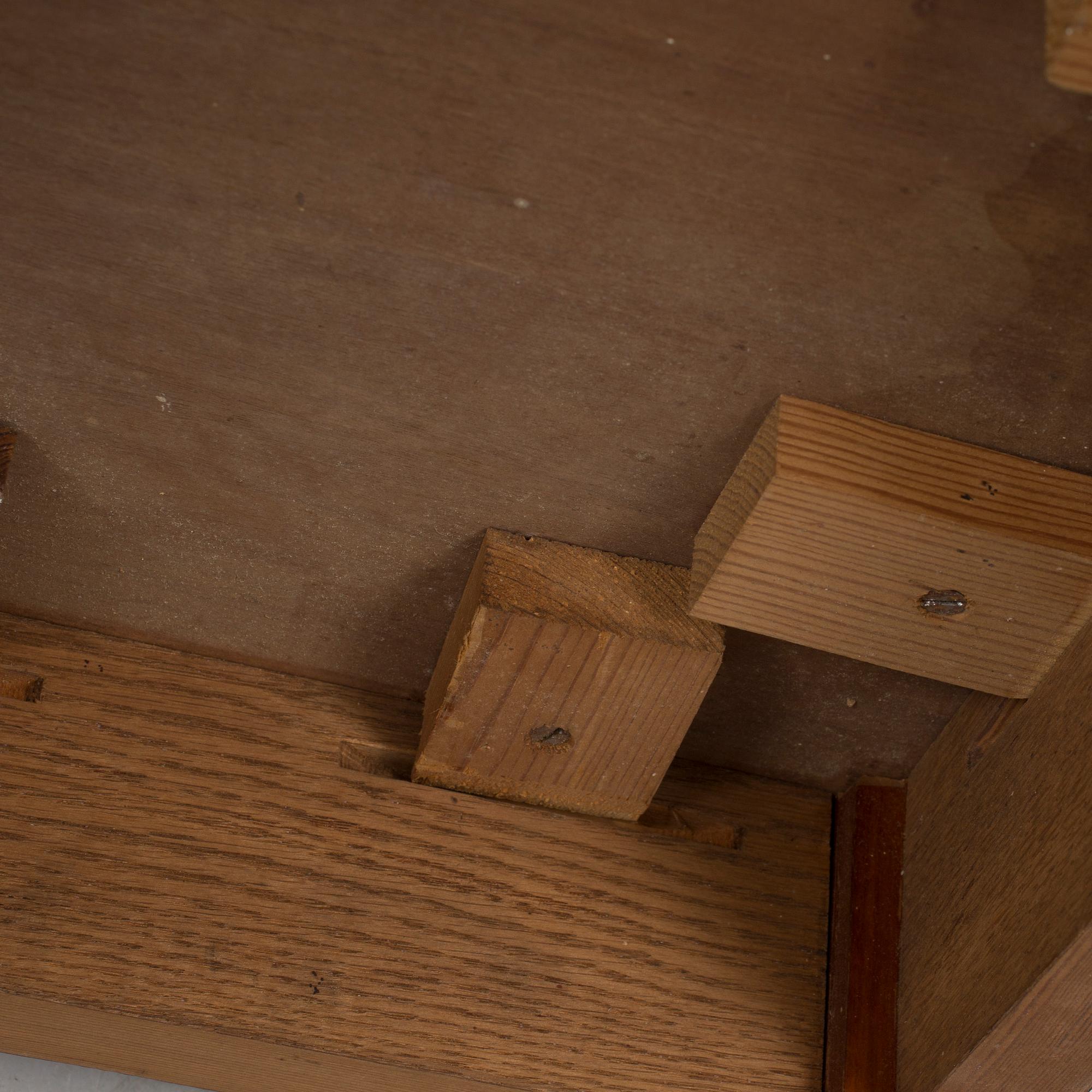 A mid 20th century mahogany veneered table from Nordiska Kompaniet (NK).