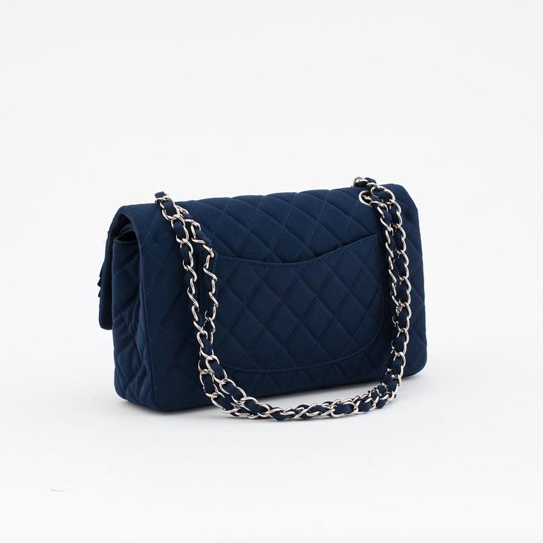 CHANEL, a quilted blue silk "Double Flap" shoulder bag with sequin embellishment.