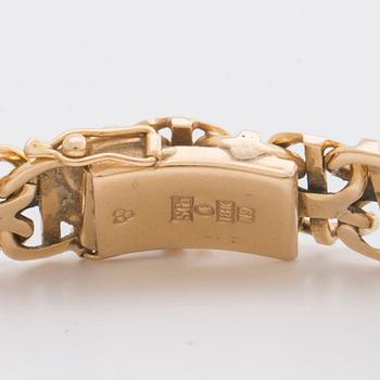 An 18 Carat gold bracelet weight ca 33,4 gr.