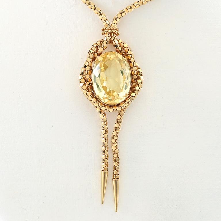 Necklace 18K gold with an oval faceted green synthetic spinel.