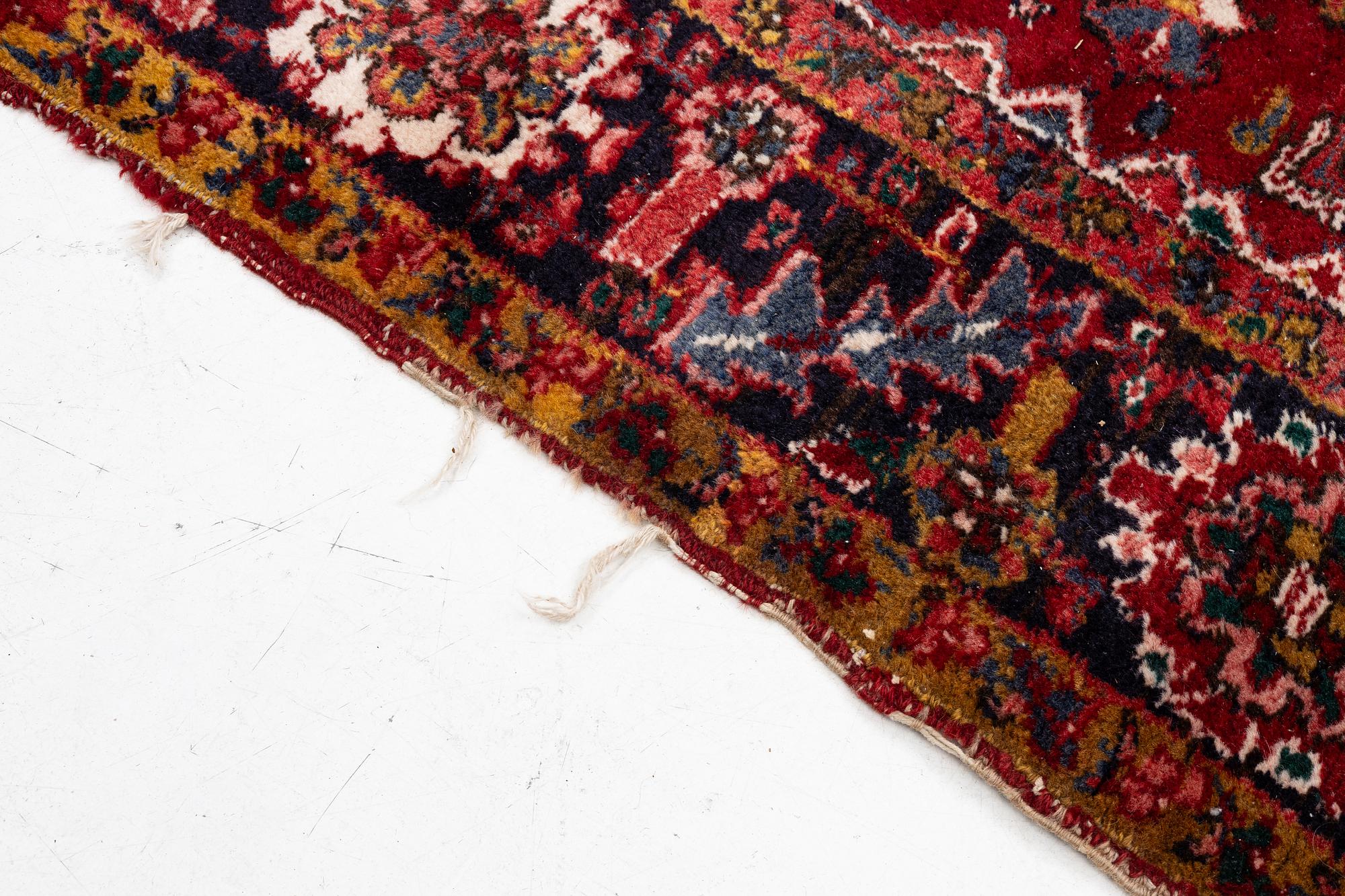 Rug, Heris, approx. 345 x 238 cm.