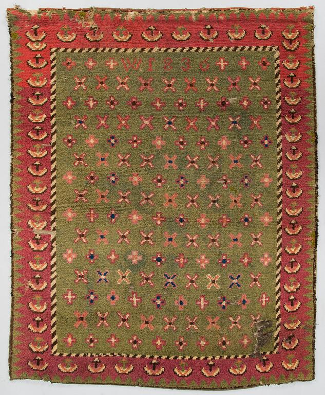 A Finnish folkart long pile ryijy.rug dated 1836. Circa 180 x 140 cm.