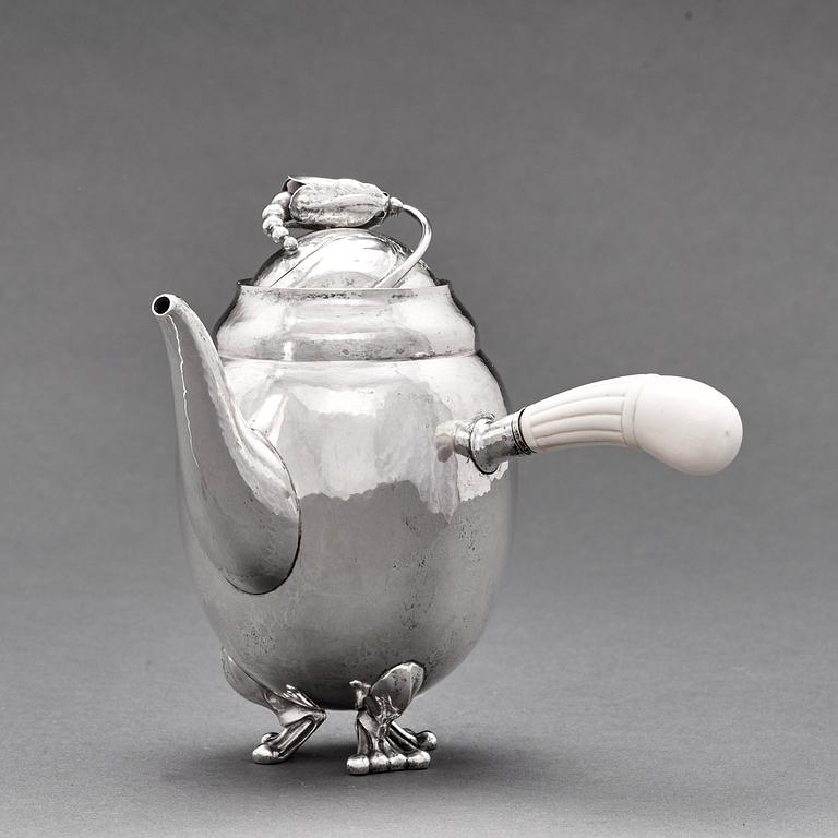 Georg Jensen, a three pieces coffee and tea service, "Blossom", Copenhagen Denmark 1915-21 830/1000 silver. Design nr 2,