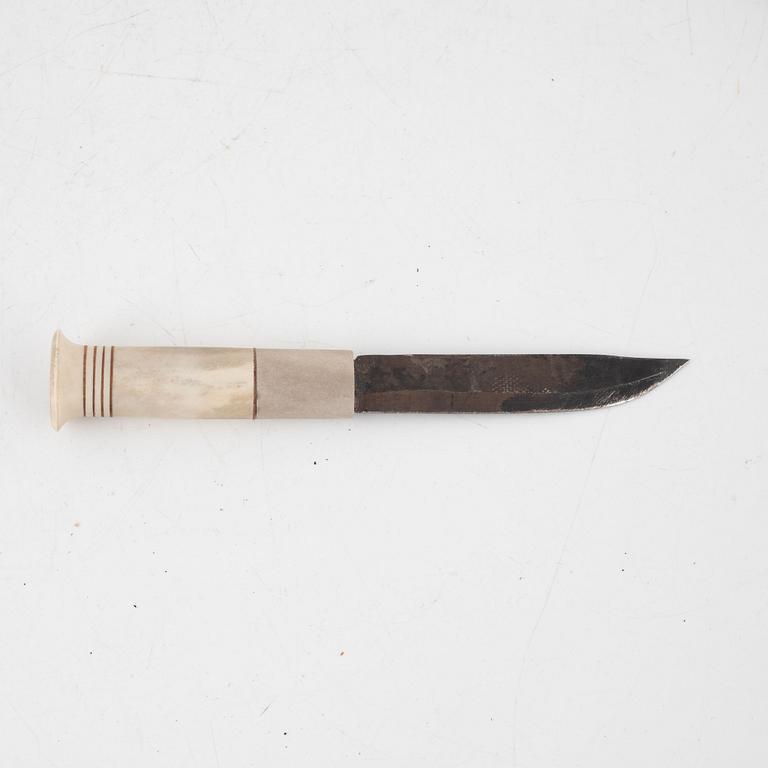 Thore Sunna, a reindeer horn knife, signed.