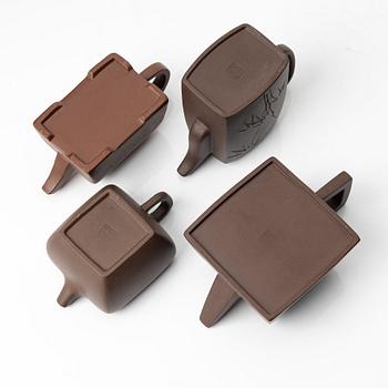 A group of four square yixing teapots, China, 1970/80s.