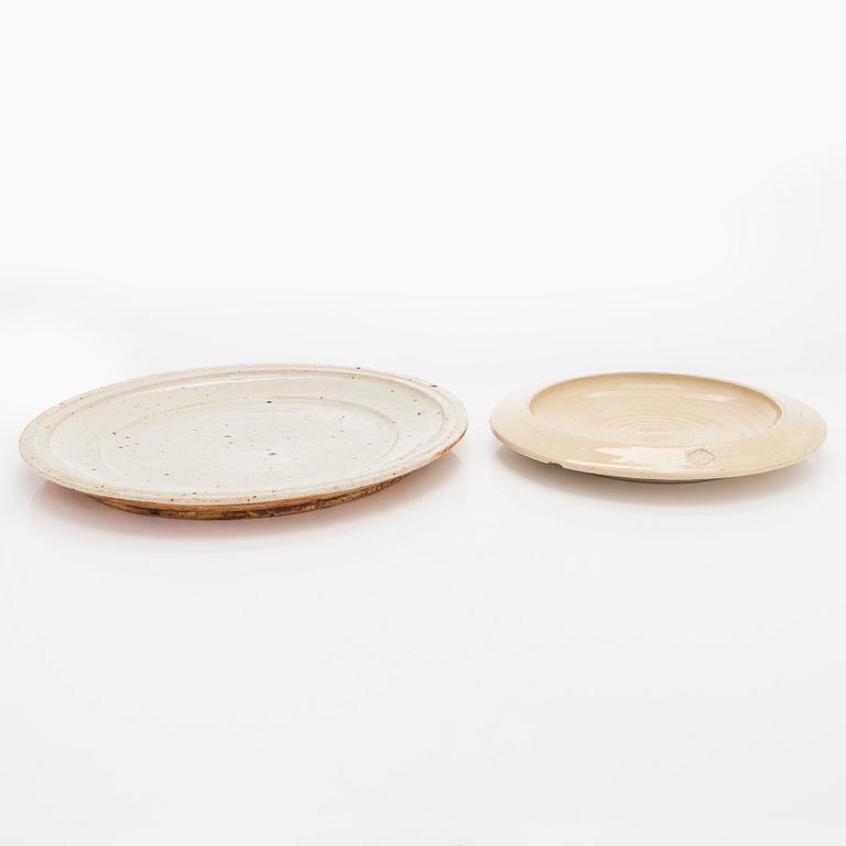 Kyllikki Salmenhaara, two stoneware plates signed KS and a book signed by Kyllikki Salmenhaara.