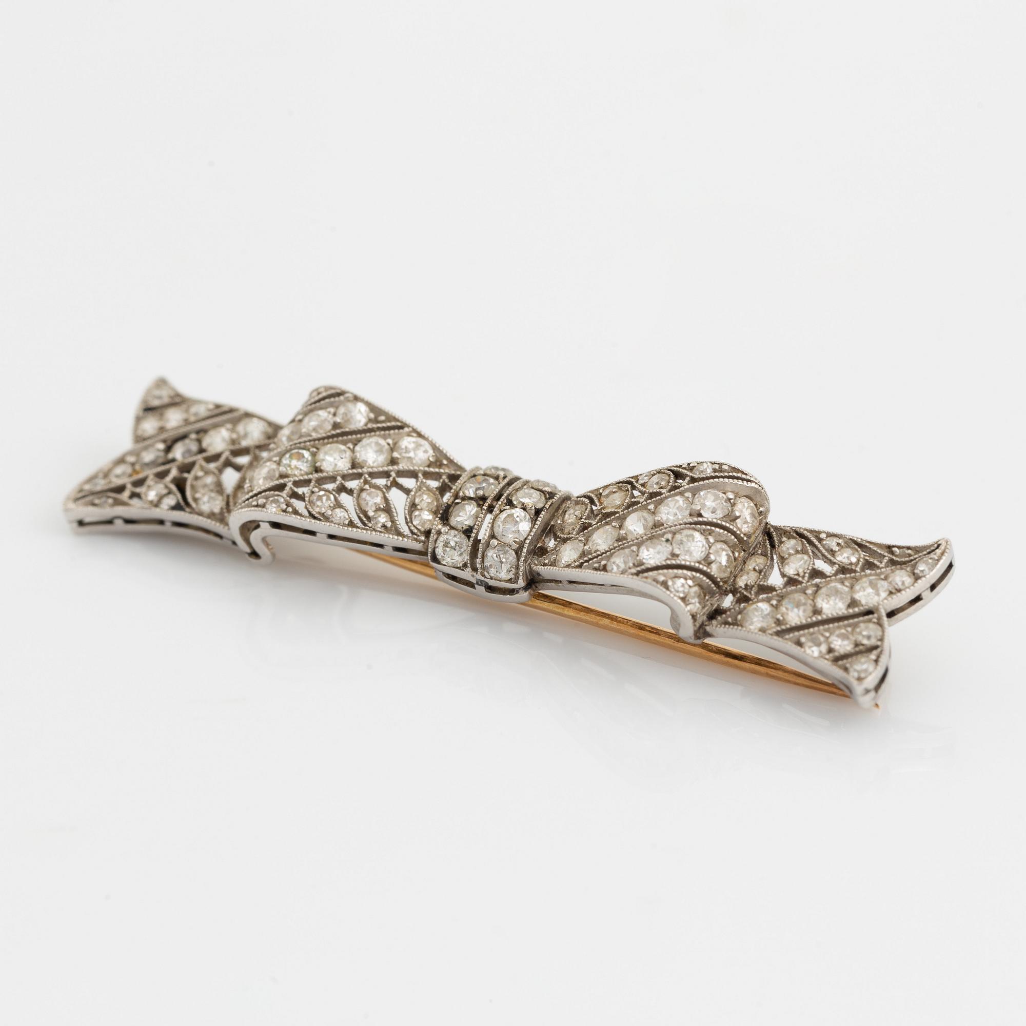Old cut diamond bow brooch.