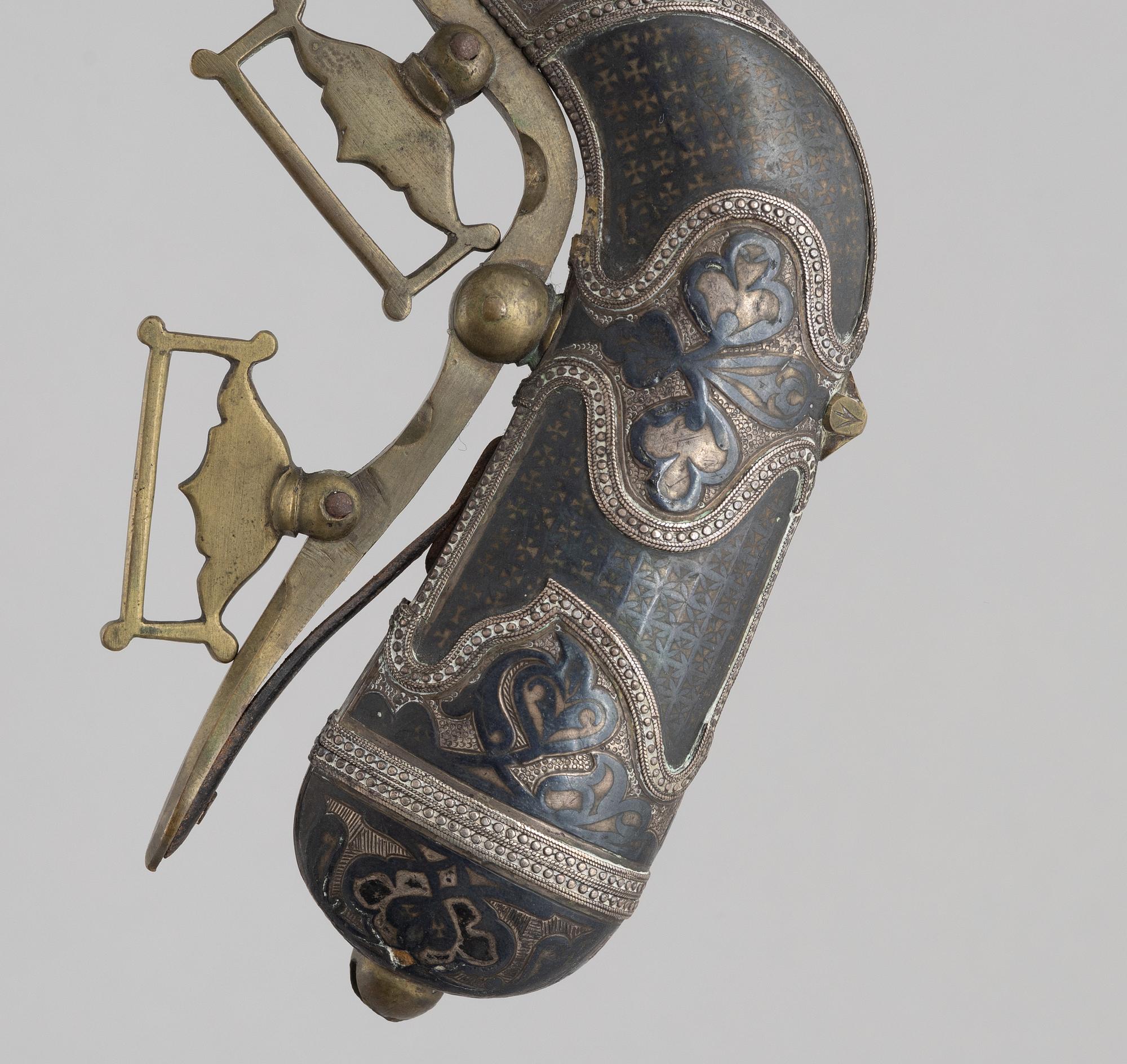 A Caucasian priming flask.