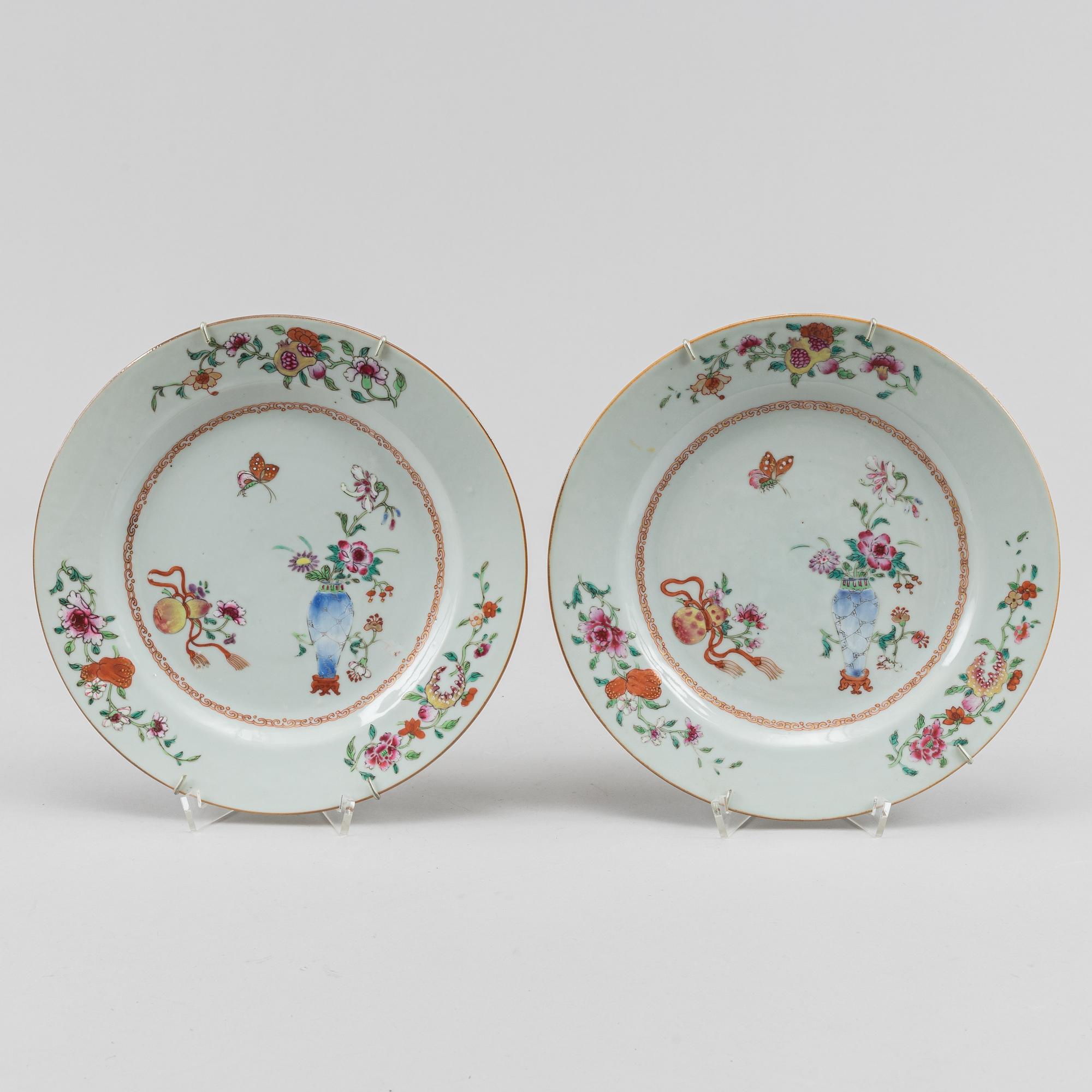 A famille rose dish and two dinner plates, Qing dynasty, Qianlong (1736-95).