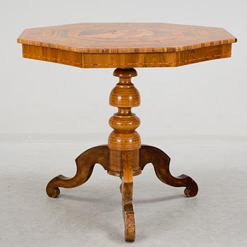 a neo rennaissance table from the late 1800's, possibly from Italy.