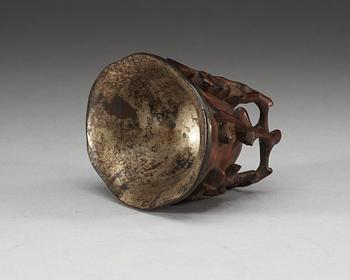 A carved bambu libation cup, Qing dynasty.