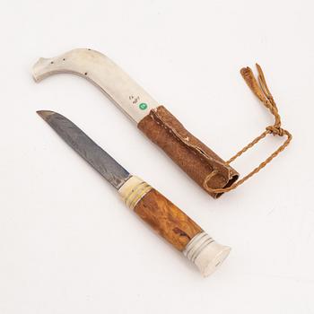 A reindeer horn knife by Lars Olof Parfa, signed and dated 1971.