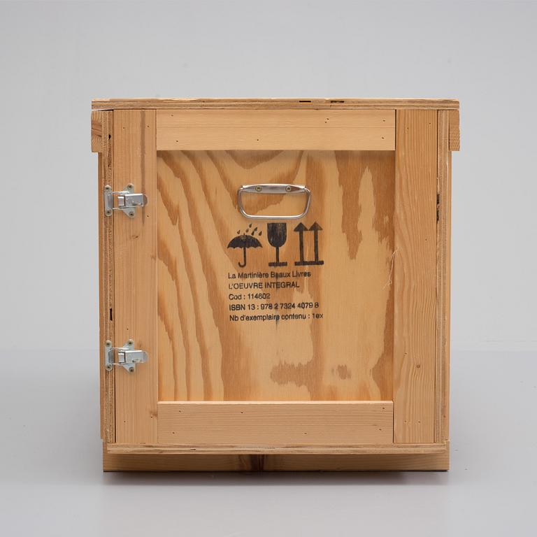 "YVES SAINT LAURENT. Haute Couture. L'OEUVRE INTÉGRAL 1962-2002". Ltd edition in a specially made custom wooden cabinet.