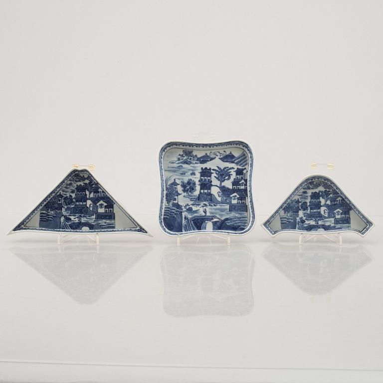 A nine piece Chinese porcelain cabaret in its original lacquer box, Qing dynasty, Qianlong (1736-95).