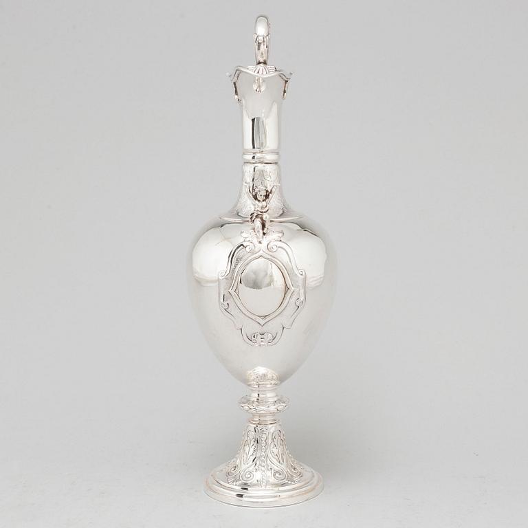 An English 19th century silver wine-jug, mark of Joseph Angle, London 1860.