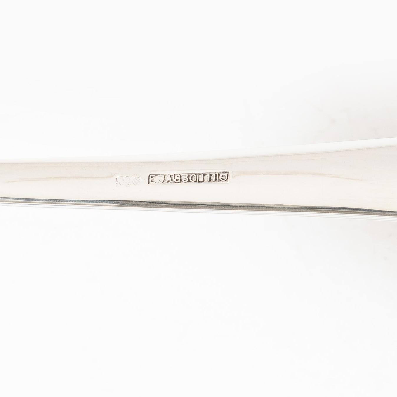 A 36-piece silver cutlery service, model Chippendale, EJA, 20207.